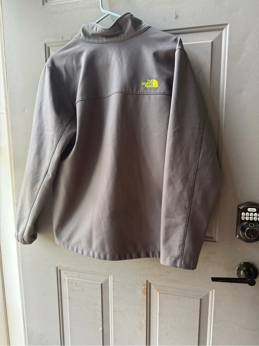 The North Face Gray Softshell Jacket with Yellow Zippers
